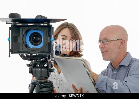 young woman cameraman and the mature man Stock Photo