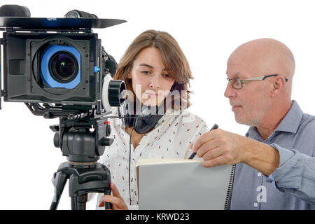 young woman cameraman and the mature man Stock Photo