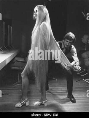 Woman With Extremely Long Blonde Hair England Great Britain