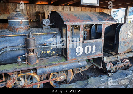 Narrow gauge 2-6-0 steam locomotive used in the 1950's for low clearance duties in Arkansas diamond mines, in disrepair, found in Warm Springs GA, USA Stock Photo