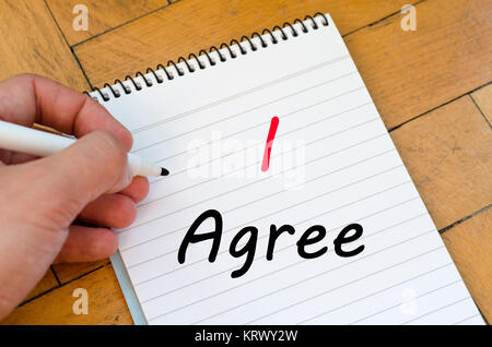 I agree concept on notebook Stock Photo