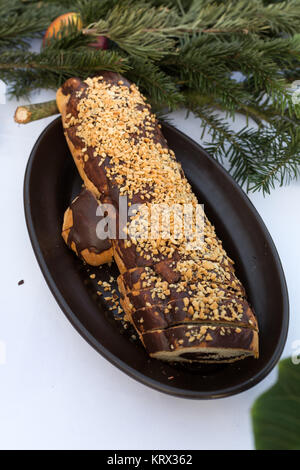 poppy seed Roll on brown plate Stock Photo