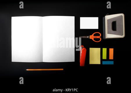 Mock up on the black background, with stationery. Stock Photo