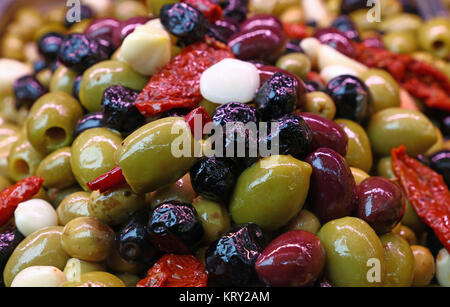 Salad mix of olives in oil close up Stock Photo