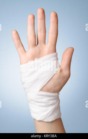 Injured hand with bandage Stock Photo