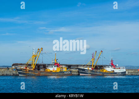 Two Trawlers berthed in Newlyn Harbour Penzance Cornwall Stock Photo