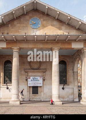 LONDON, UK - JUNE 18, 2013: Street artist performing at Saint Paul's Church in Covent Garden, one of the main tourist attractions in London Stock Photo