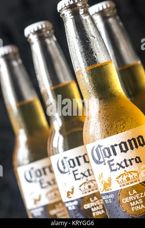 SUMY, UKRAINE - DECEMBER 20, 2017: Bottles of Corona Extra Beer. Corona is one of the top-selling beers worldwide. Stock Photo