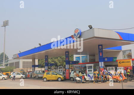 People buy petrol at HP petrol station in New Delhi India. Hindustan Petroleum HP is Indian state owned oil and natural gas company headquartered in M Stock Photo