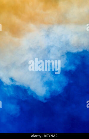 Blue cloudscape sky with fire smoke. Stock Photo