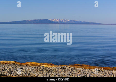 View across Yellowstone Lake in the early morning, Yellowstone National Park, USA Stock Photo