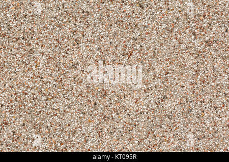 Close up image of a pebble-dashed wall Stock Photo