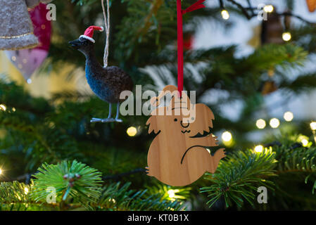 Australian Christmas tree decorations - a festive Koala and a Cassowary in a santa hat. Stock Photo