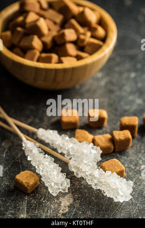 Crystallized sugar on wooden stick. Stock Photo