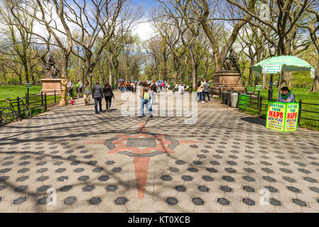 The view down The Mall in Central Park on a sunny Spring day, tourists can be seen walking along the path, Manhattan, New York, USA