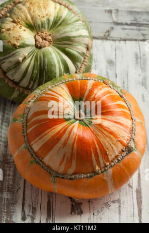 Fresh heirloom orange and green Turban squash Stock Photo