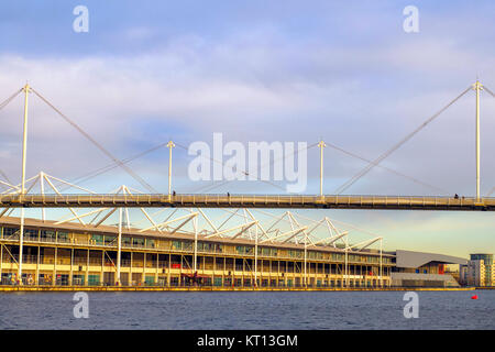 Suspension bridge over Royal Victoria Docks and the waterfront section of the Excel Exhibition Centre -  London, England Stock Photo