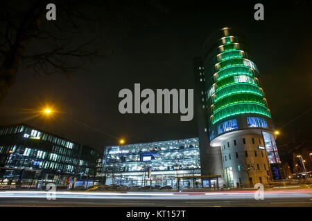MUNICH, GERMANY - DECEMBER 11, 2017 : A view of the Mercedes Benz dealership building exterior at night in Munich, Germany. Stock Photo
