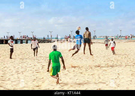 Locals playing football on the beach at Santa Maria, Sal Island, Salina, Cape Verde, Africa Stock Photo