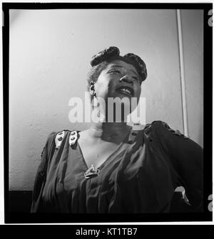 This iconic photograph captures Ella Fitzgerald, one of the greatest jazz singers, in New York around November 1946, showcasing her contribution to the jazz and music world during the height of her career. Stock Photo