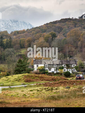 A traditional terrace of houses in Elterwater village in Langdale, in England's Lake District National Park. Stock Photo