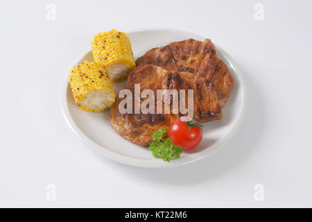 grilled pork and corn cob Stock Photo