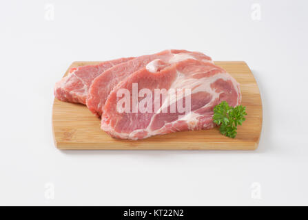 raw pork steaks Stock Photo