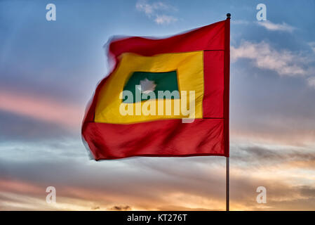 waving Cartagena flag again sunset Stock Photo