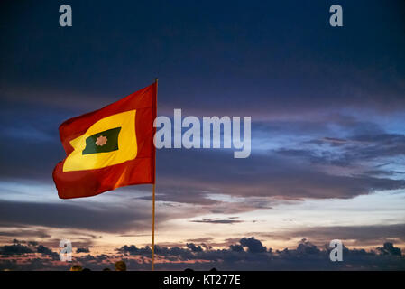 waving Cartagena flag again sunset Stock Photo