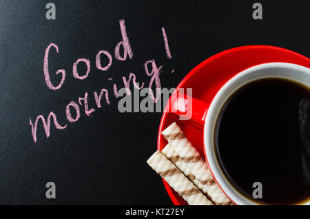 Cup of Coffee and Cookie on a Dark Background. Stock Photo