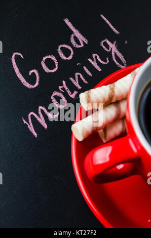 Cup of Coffee and Cookie on a Dark Background. Stock Photo