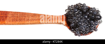salty black dyed caviare of halibut in wood spoon Stock Photo