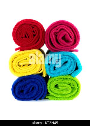 Colored bathroom towels isolated against a white background Stock Photo