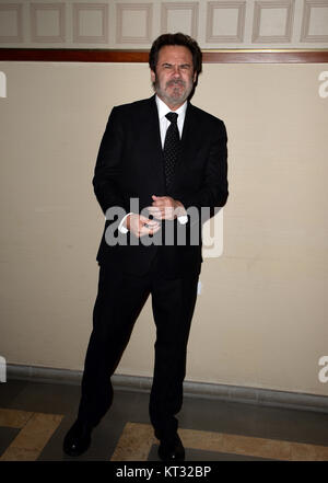 BOCA RATON, FL - NOVEMBER 21:  Dennis Miller arrives at 26th Annual Chris Evert/Raymond James Pro-Celebrity Tennis Classic Gala at The Boca Raton Resort on November 21, 2014 in Boca Raton, Florida.   People:  Dennis Miller Stock Photo