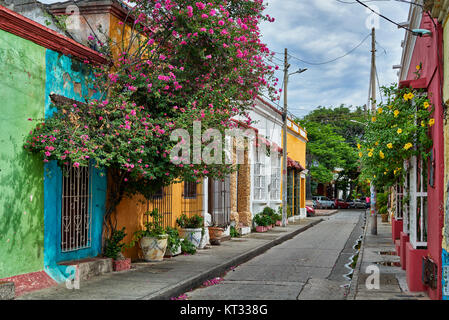 typical colorful facades with flowers of houses in district Getsemani of Cartagena de Indias, Colombia, South America Stock Photo