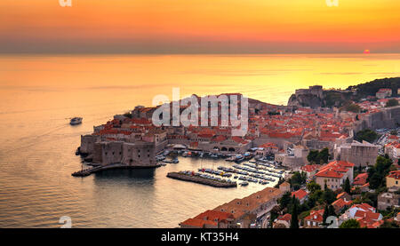 Sunset view over the famous fortified city of Dubrovnik in Croatia. The city is on the Unesco World Heritage List. Stock Photo
