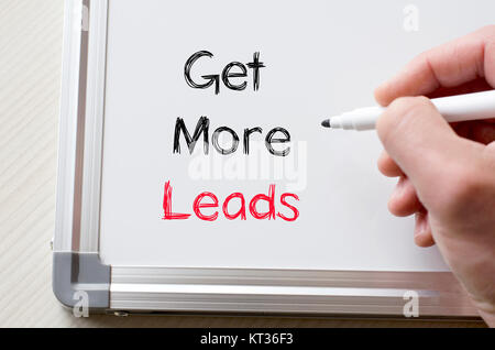 Get more leads written on whiteboard Stock Photo