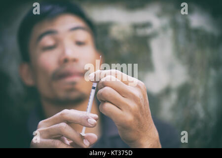 drug addict man Stock Photo