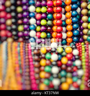 Wooden colored beads on display on the market in Zakopane, Poland Stock Photo