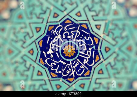 YAZD, IRAN - OCTOBER 07, 2016:  Tiled background, oriental ornaments from Amir Chakhmaq Complex in Yazd, southern Iran Stock Photo