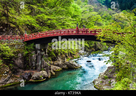 Red sacred bridge Shinkyo in UNESCO site of Nikko, Japan Stock Photo