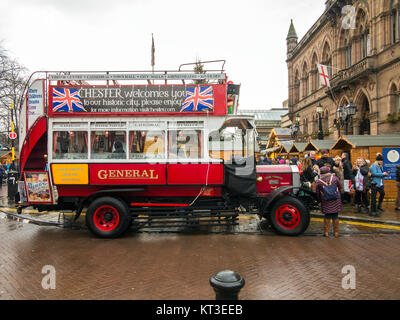 Vintage open topped double decker bus used to give guided tours in the roman city of Chester England Stock Photo