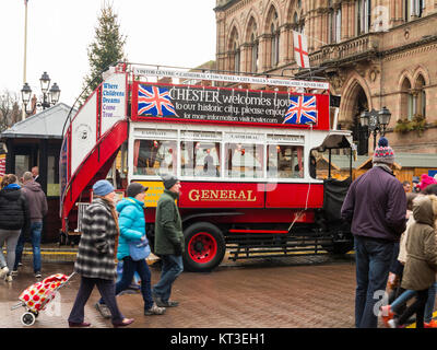 Vintage open topped double decker bus used to give guided tours in the roman city of Chester England Stock Photo