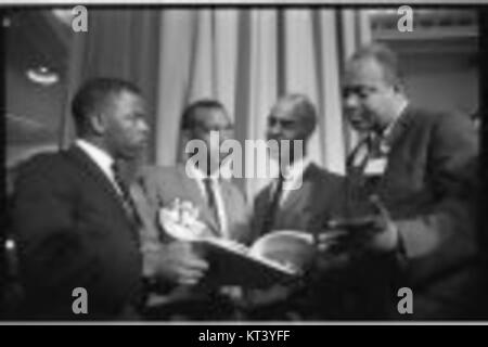 Roy Wilkins, a prominent civil rights leader, is captured during an ...