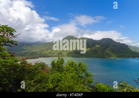 Scenic landscape view of Kaluapuleho Point from Crouching Lion hike, Oahu, Hawaii with lush green tropical rainforest vegetation in a State Park reser Stock Photo