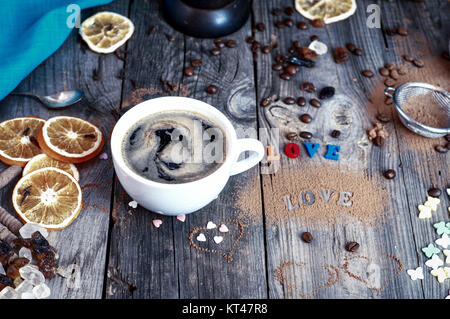 cup of black hot coffee on a gray wooden surface Stock Photo