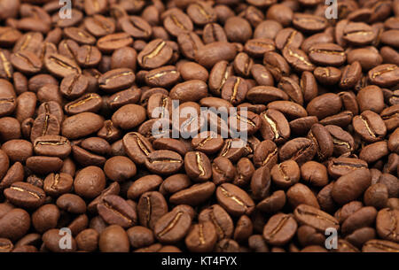 Roasted Arabica coffee beans background high angle Stock Photo