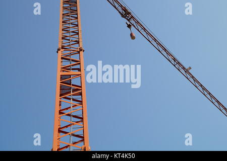 abstract image,part of arm machinery construction crane with blue sky background Stock Photo