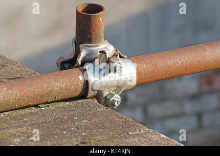 Scaffolding pipe clamp and parts, An important part of building strength to scaffold. Stock Photo