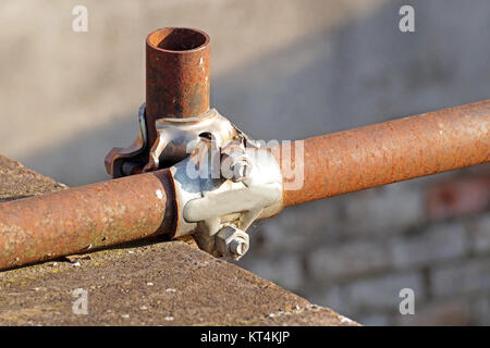 Scaffolding pipe clamp and parts, An important part of building strength to scaffold. Stock Photo